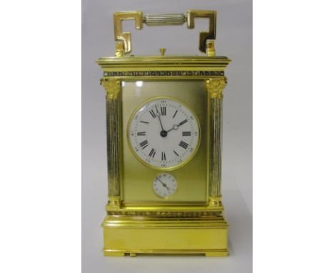 A 19th Century Musical Alarm Carriage Clock:
a fully refurbished clock in full working order with alarm.  Twin dials.   For t