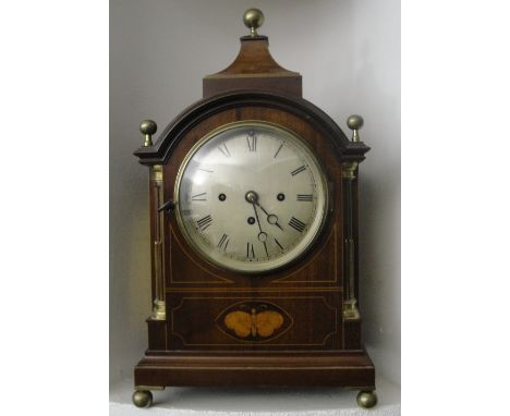 A 19th Century Inlaid Bracket Clock:
a mahogany case with ball finials and ball feet.  Butterfly inlay in cartouche beneath s