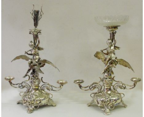 Two Art Nouveau WMF Table Centrepieces:
both with maiden on an eagle holding a cornucopia: one supporting a glass tazza, the 