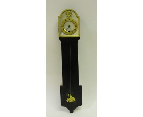 A 19th Century Miniature Clock:
Gilt clock with mother of pearl dial and gilt chapter ring,swing pendulum with gilt Zeus hold