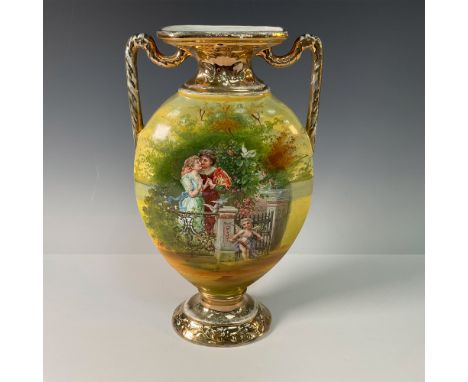 A striking Empire Porcelain Company double-handle vase, crafted in England. This finely detailed piece features an opulent ha