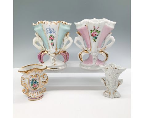 A charming 4-piece porcelain spill vase set featuring hand-painted floral motifs with gilt accents. The pair of larger vases 