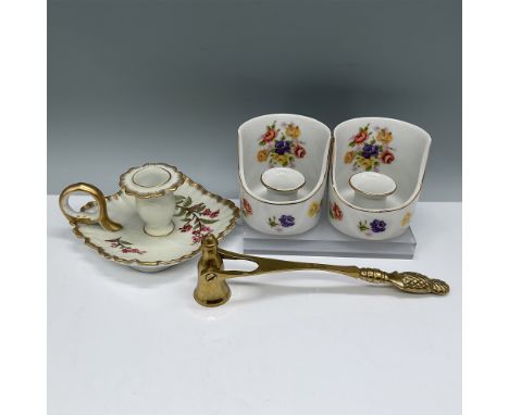 A charming 4-piece collection featuring two porcelain floral match holders with attached strikers, a matching porcelain chamb