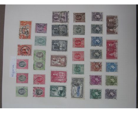 Five Junior Albums with Mainly used World Stamp Collection. Many commonwealth countries with King George VI values to 3/-. A 