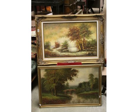 Two vintage oil paintings of landscape scenes in gilt frames.