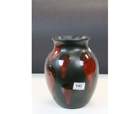 Poole Pottery ceramic Vase in Black with drip red Lava abstract pattern &amp; raised dolphin mark to base, stands approx 25cm