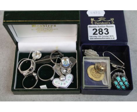 A selection of vintage and contemporary silver jewellery to include rings and earrings.