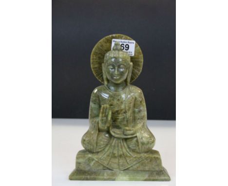 Vintage carved stone figure of a seated Buddha 