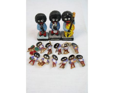 11 vintage Robertson's Golly badges, a Robertson's Enamel Fruit Jam badge and three painted plaster Bandsmen