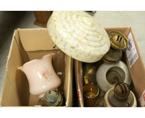 Two boxes containing a quantity of vintage lamps and shades