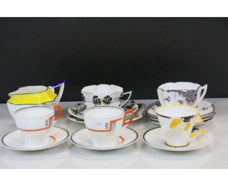 Five Art Deco period Shelley ceramic Cup &amp; saucers, various designs to include Trio &amp; a Cream jug, again in Deco styl