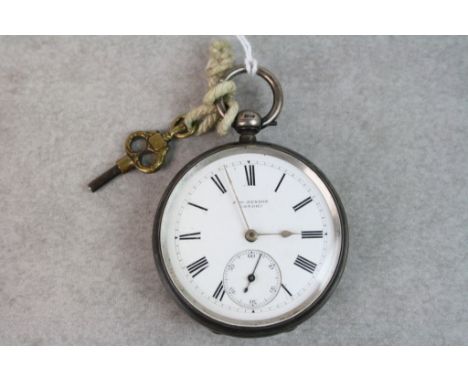 Hallmarked Silver Key Wind Pocket watch with engine turned decoration &amp; Enamel dial marked "J W Benson London" with sub d