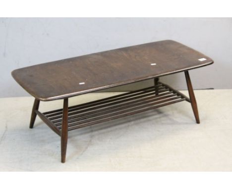 Ercol Dark Elm Coffee Table with Spindle Shelf below, 103cms x 46cms x 36cms high