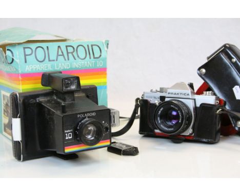 Cased Praktica T73 camera and a boxed Polaroid instamatic camera 