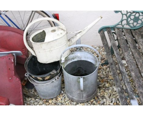 Three vintage buckets and two watering cans 