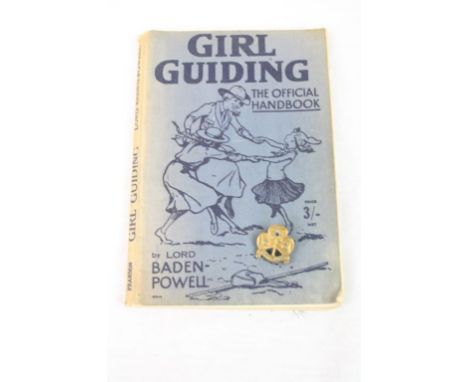 Original girl guiding book by Lord Baden-Powell and Girl Guide cap badge