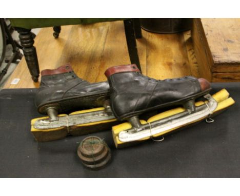 A pair of vintage ice skates.