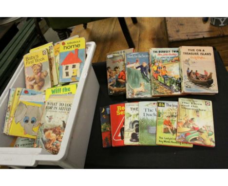 A large collection of vintage ladybird books, to also include three vintage Enid Blyton books including a first edition and a