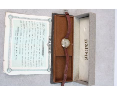 Vintage boxed Ladies Hallmarked 9ct Gold wristwatch in a "Baume" watch box with papers