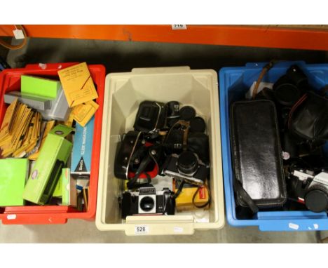 A collection of vintage photographic equipment of mainly cameras and lenses to include a Pentax ME F 35mm SLR Camera, togethe