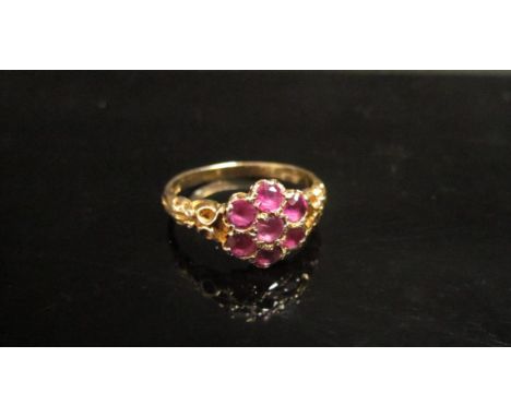 A 9ct gold ruby cluster ring. Size O, 2.5g 