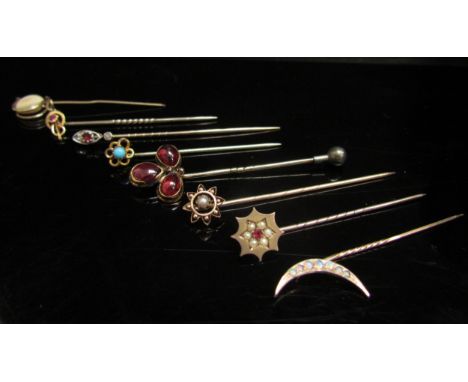 Eight various stick pins, including diamond and ruby, opal, cabochon garnet, turquoise and seed peal examples, 12.8g 