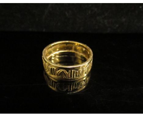 A 22ct gold pierced band. Size K, 4g 