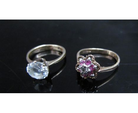 Two 9ct gold rings including ruby and diamond cluster (bent) and a ring set with a clear stone, 4.9g 