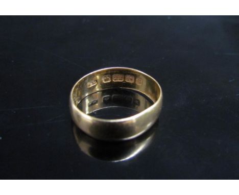 A 22ct gold wedding band. Size J/K, 3.1g 