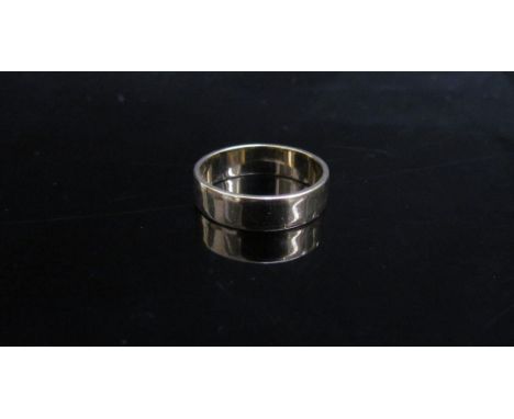 A gold band. Size M/N. 2.8g 