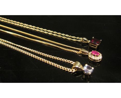 Three 9ct gold chains hung with pendants including ruby and diamond cluster, topaz and garnet, 40cm long chains, 7g 