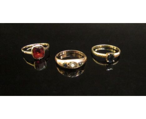 Three 9ct gold rings including sapphire example, all size M, 4.5g 