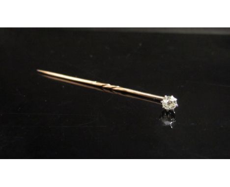 A diamond stick pin, 0.20ct approx, boxed 