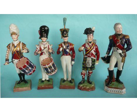 A set of four early-19th century Dresden porcelain figures depicting: drummers of the 3rd (legs repaired and drum stick glued