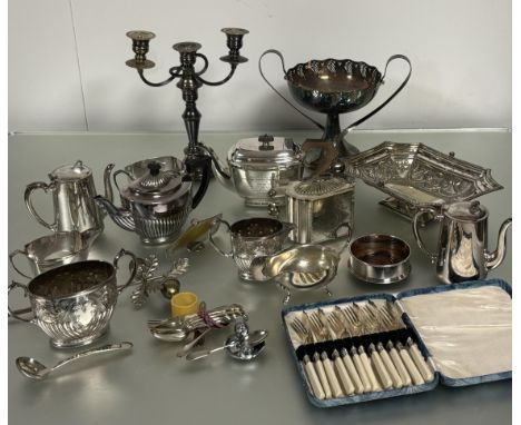 A large collection of Epns to include a three piece tea set, a two handled WMF style fruit stand, a tea caddy, a three branch