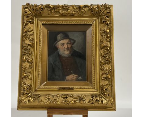Konstantin Stoitzner (Austrain 1863-1933), A pair of portraits, one depicting a man holding a pipe, signed bottom left the ot