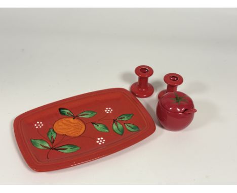 A West Germany pottery orange tree and red enamelled decorative flat dish, a ceramic tomato shaped sugar dish with spoon and 