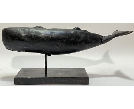 Ramsay Gillies, a folk art inspired carved wooden model sculpture of a Sperm Whale with jointed tail, mounted on a wooden pli