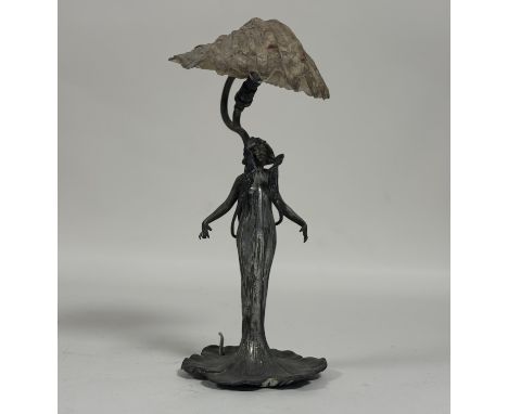 A French late 19thc cast metal Art Noveau standing figure lamp with Calla lilly flowers twinning round the body with brass co