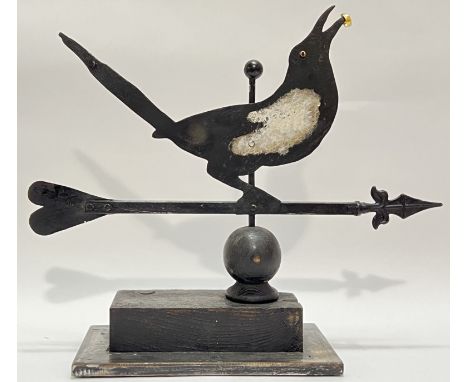 Ramsay Gillies, a folk art inspired wrought and cast iron model of a magpie with stolen gold ring, mounted on a wooden base (