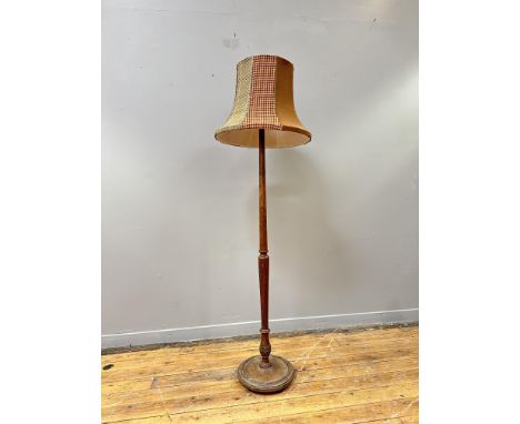 A 1920s stained beech turned wood fluted column floor lamp on circular moulded base with bun feet, with Joey D&nbsp;tweed pan