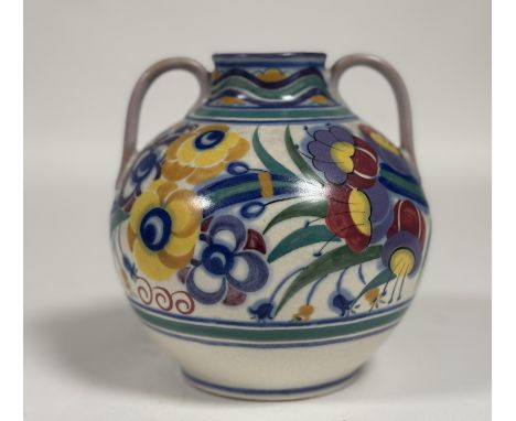 A 1920s-30s Poole pottery twin handled vase decorated with stylized fower and leaf design in polychome enamels ipmpressed mar