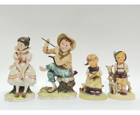 A mixed group of bisque ware figures comprising two Goebel figurines, one of a boy with animals, and one of a girl writing th