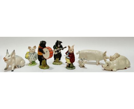 A group of Beswick pig figures comprising Beatrix Potter 'Little Pig Robinson' (marked verso, loss to ear, h- 10cm), two Besw