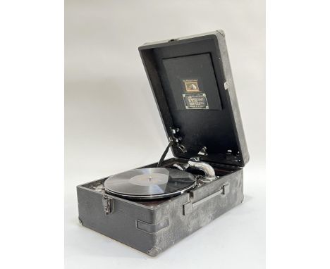 A 1929 HMV model 102 portable gramophone, catalogue number JC 35031 with Charlie Kunz vinyl record (l- 42cm)