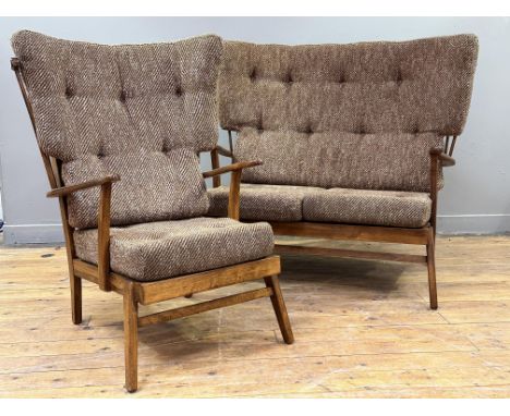 A 1950s classic Parker Knoll ash high back two part suite with easy chair and two seater sofa with brown tweed covered button