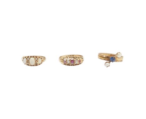 Three gem set ringsto include an 18ct gold opal and diamond set ring; an 18ct gold five stone ruby and diamond set ring; and 