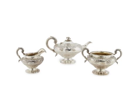 A William IV three piece tea serviceCharles Fox, London 1834, comprising a teapot, sugar bowl and cream jug, all of circular 