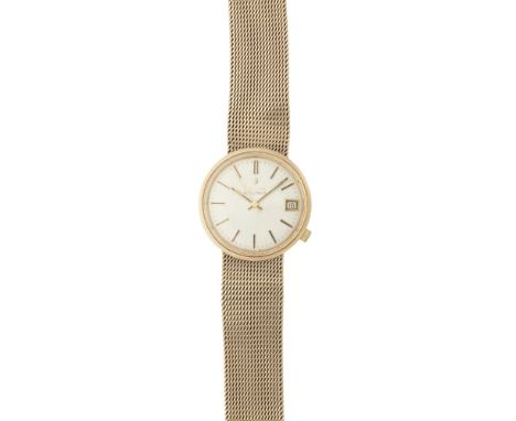 A gentleman's 9ct gold wrist watch, BulovaAccutron, silvered brushed dial with gilt baton indicators, sweep second hand, date