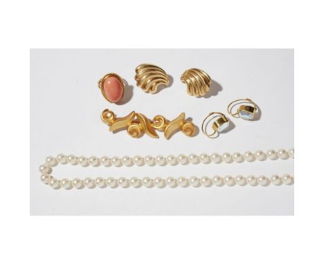 A freshwater cultured pearl necklace, Mikimotocomposed of a uniform strand of cultured pearls, to an 18ct gold openwork clasp